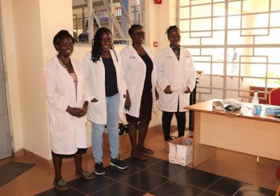 A section of the MMUST healthcare workers poses for a group photo at one of the service stations.